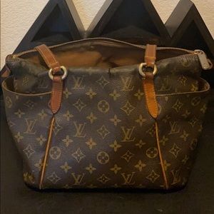 Louis Vuitton bag/Fair condition/Extensive damage/Was a gift back in 2013
